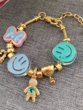 Kids Gold-Tone Bracelet with Pastel Smile Charms and Pink Butterfly